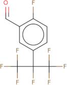 2-Fluoro-5-(1,1,1,2,3,3,3-heptafluoropropan-2-yl)benzaldehyde