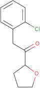 2-(2-Chlorophenyl)-1-(oxolan-2-yl)ethan-1-one