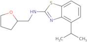 4-Isopropyl-N-(tetrahydrofuran-2-ylmethyl)-1,3-benzothiazol-2-amine