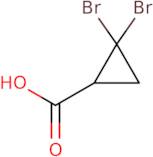 2,2-Dibromocyclopropane-1-carboxylic acid