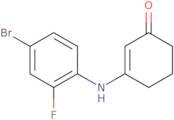 3-[(4-Bromo-2-fluorophenyl)amino]cyclohex-2-en-1-one