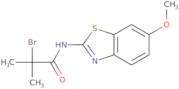 2-Bromo-N-(6-methoxy-1,3-benzothiazol-2-yl)-2-methylpropanamide