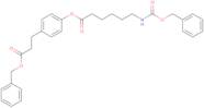 Benzyl 3-(4-(N-benzyloxycarbonxyl-6-aminocaproyloxy)phenyl)propionate