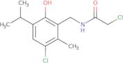 2-Chloro-N-(3-chloro-6-hydroxy-5-isopropyl-2-methylbenzyl)acetamide