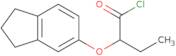 2-(2,3-Dihydro-1H-inden-5-yloxy)butanoyl chloride