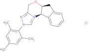 (-)-(5aS,10bR)-5a,10b-Dihydro-2-(2,4,6-trimethylphenyl)-4H,6H-indeno[2,1-b][1,2,4]triazolo[4,3-d][1,4]oxazinium Chloride Monohydrate