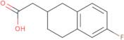 (6-Fluoro-1,2,3,4-tetrahydro-2-naphthalenyl)acetic acid