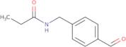 N-[(4-Formylphenyl)methyl]propanamide