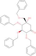 (2R,3S,4S,5S)-5-Hydroxy-2,3,4-tris(phenylmethoxy)-5-[(phenylmethoxy)methyl]-cyclohexanone