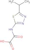 [(5-Isopropyl-1,3,4-thiadiazol-2-yl)amino](oxo)acetic acid