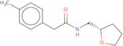 2-(4-Methylphenyl)-N-{[(2S)-oxolan-2-yl]methyl}acetamide