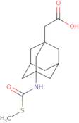 (3-{[(Methylthio)carbonyl]amino}-1-adamantyl)acetic acid