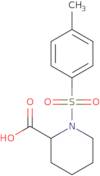 1-[(4-Methylphenyl)sulfonyl]piperidine-2-carboxylic acid