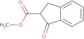 Methyl 1-oxo-2,3-dihydro-1H-indene-2-carboxylate