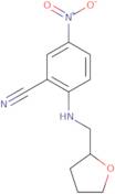5-Nitro-2-[(tetrahydrofuran-2-ylmethyl)amino]benzonitrile