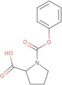 1-(Phenoxycarbonyl)pyrrolidine-2-carboxylic acid