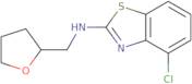 4-Chloro-N-(tetrahydrofuran-2-ylmethyl)-1,3-benzothiazol-2-amine