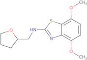 4,7-Dimethoxy-N-(tetrahydrofuran-2-ylmethyl)-1,3-benzothiazol-2-amine