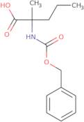 2-{[(Benzyloxy)carbonyl]amino}-2-methylpentanoic acid