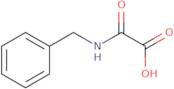 (Benzylcarbamoyl)formic acid