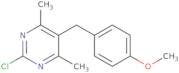 2-Chloro-5-[(4-methoxyphenyl)methyl]-4,6-dimethylpyrimidine