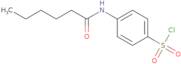 4-Hexanamidobenzene-1-sulfonyl chloride