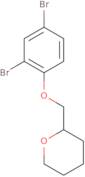 2-((2,4-Dibromophenoxy)methyl)tetrahydro-2H-pyran