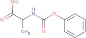 2-[(Phenoxycarbonyl)amino]propanoic acid