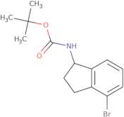 tert-Butyl N-[(1R)-4-bromo-2,3-dihydro-1H-inden-1-yl]carbamate