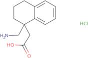 2-[1-(Aminomethyl)-1,2,3,4-tetrahydronaphthalen-1-yl]acetic acid hydrochloride
