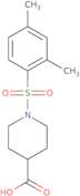 1-(2,4-Dimethylbenzenesulfonyl)piperidine-4-carboxylic acid