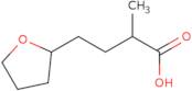 2-Methyl-4-(oxolan-2-yl)butanoic acid