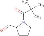 1-(2,2-Dimethylpropanoyl)pyrrolidine-2-carbaldehyde