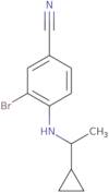 3-Bromo-4-[(1-cyclopropylethyl)amino]benzonitrile