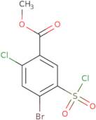 Methyl 4-bromo-2-chloro-5-(chlorosulfonyl)benzoate