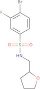 4-Bromo-3-fluoro-N-(tetrahydrofuran-2-ylmethyl)benzenesulfonamide