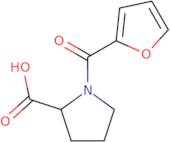 1-(Furan-2-carbonyl)pyrrolidine-2-carboxylic acid