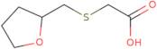 2-[(Oxolan-2-ylmethyl)sulfanyl]acetic acid