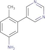 4-Methyl-3-(pyrimidin-5-yl)aniline