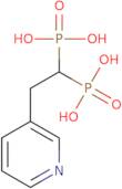 [2-(3-Pyridinyl)ethylidene]bisphosphonic acid