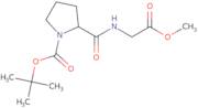 tert-Butyl (2S)-2-[(2-methoxy-2-oxoethyl)carbamoyl]pyrrolidine-1-carboxylate