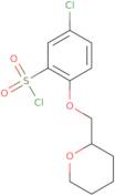 5-Chloro-2-(oxan-2-ylmethoxy)benzene-1-sulfonyl chloride