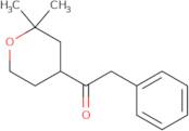 1-(2,2-Dimethyloxan-4-yl)-2-phenylethan-1-one