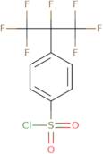 4-(Heptafluoropropan-2-yl)benzene-1-sulfonyl chloride