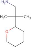 2-Methyl-2-(oxan-2-yl)propan-1-amine
