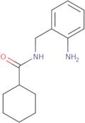 N-[(2-Aminophenyl)methyl]cyclohexanecarboxamide