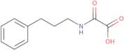 [(3-Phenylpropyl)carbamoyl]formic acid