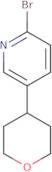 2-Bromo-5-(oxan-4-yl)pyridine