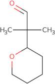 2-Methyl-2-(oxan-2-yl)propanal