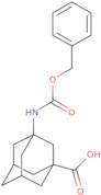 3-(((Benzyloxy)carbonyl)amino)adamantane-1-carboxylic acid